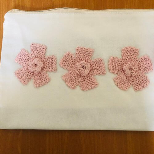 Kırık beyaz motifli el çantası